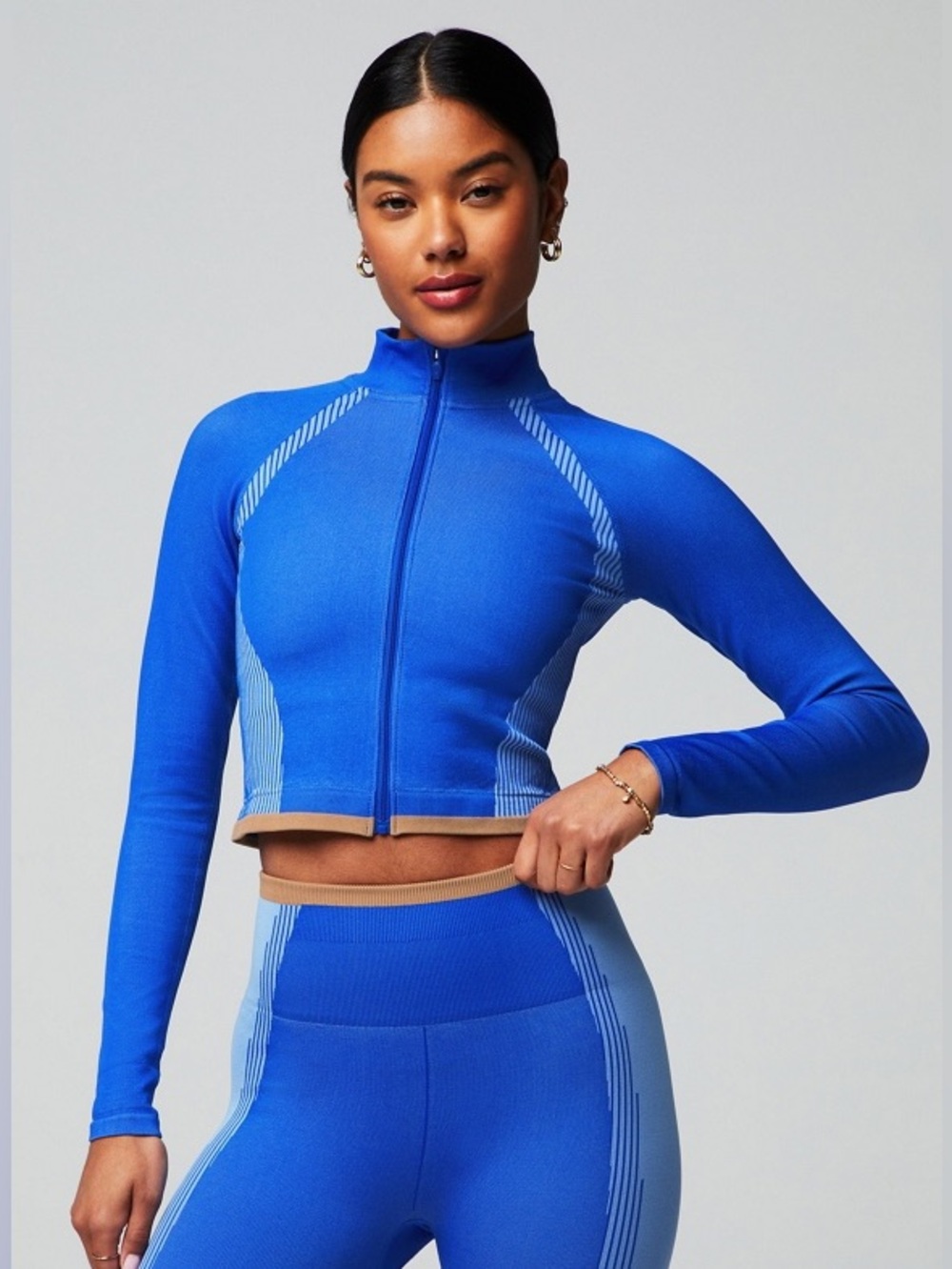 Fabletics seamless fusion jacket luminary blue cropped fitness white orange trim